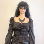 Black patterned satin puffy off shoulder long sleeve cropped blouse. Sz S