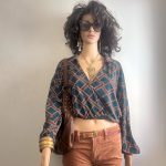 Super cute geometric patterned cropped green and orange patterned wrap top with a v-neck, cinched waist and long sleeves. Sz S/M. See Measurements