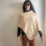 Very soft cream rabbit fur asymmetrical poncho.  O/S, See Measurements