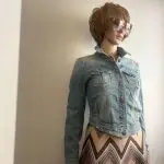 Stylish cropped light wash denim jean jacket. Sz XS