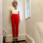 High waisted, cuffed hem, slim fit, straight cut trouser dress pants with polka dot elastic waist. Sz XS Waist 24" Elastic Waist. Little bit of stretch