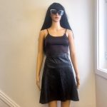 1990's Black Vegan Leather Flare Mini Skirt. Sz 12/14. See Measurements